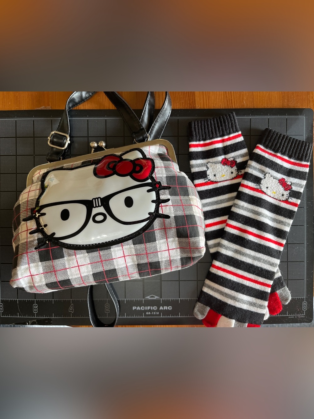 Hello Kitty Cross Body Bag by Loungefly and Toe Sox by Sanrio-Good to Fair cond